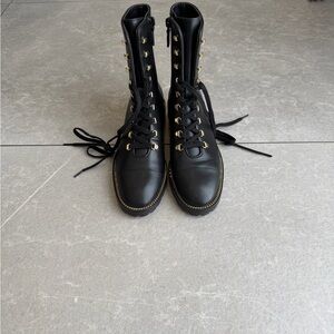 Stuart Weitzman Black Lace-Up Combat Boots with Gold Hardware